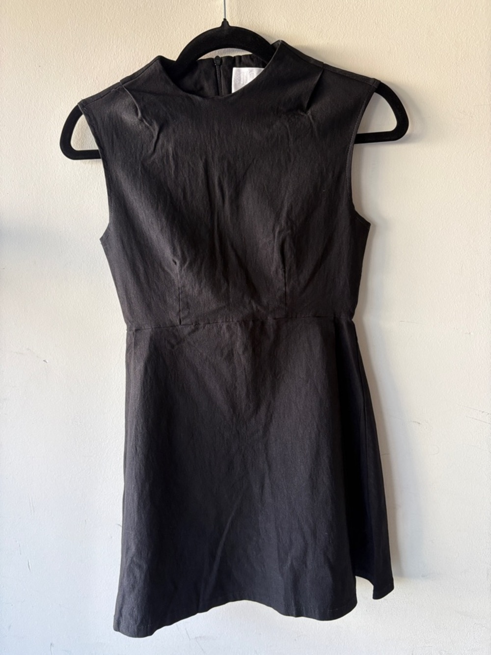 Sleeveless Black Mini Dress with High Neck